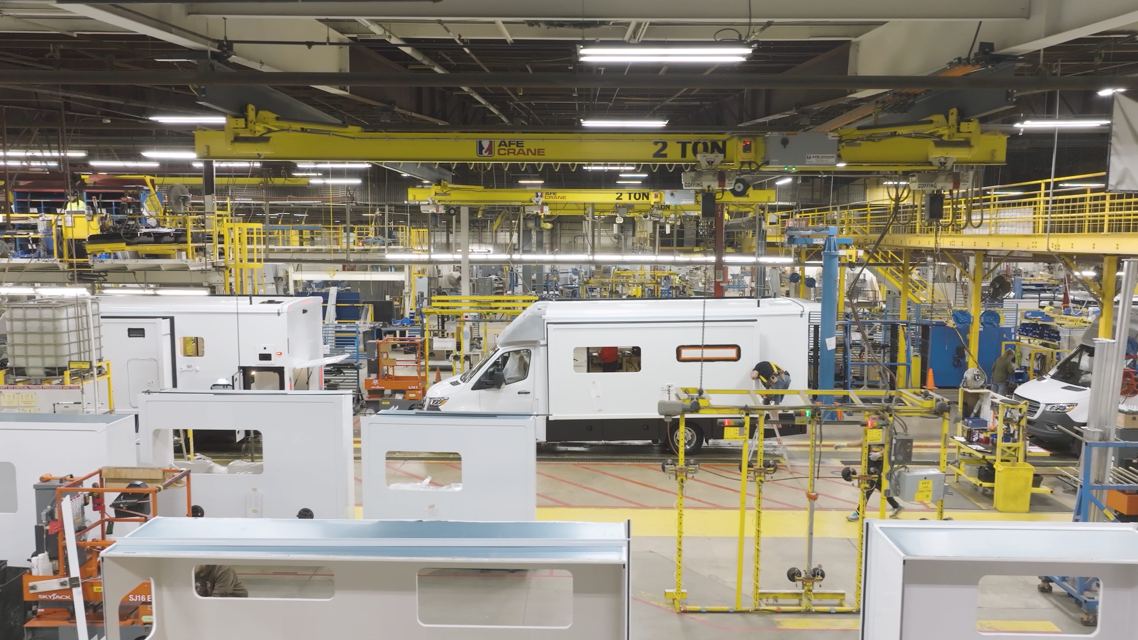 Overhead view of an RV manufacturing plant floor